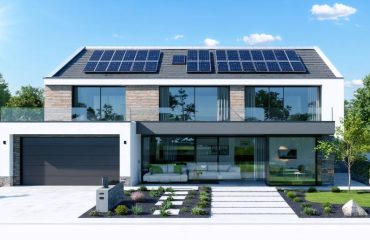 A modern home with solar shingles, solar skin, and transparent solar windows showcasing integrated solar technologies.